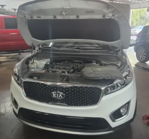 Kia Optima being repaired in Tempe